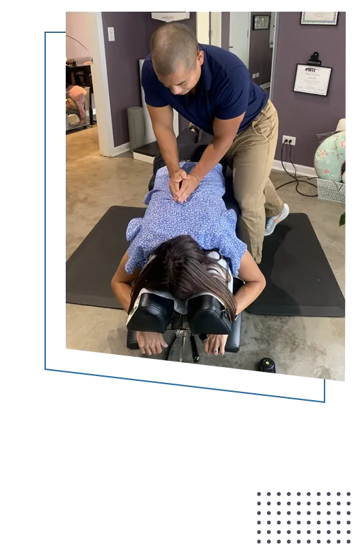 Chiropractor Lakeview IL John Nguyen Adjusting Patient